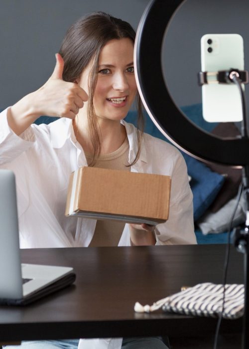 young-woman-making-unboxing-vlog